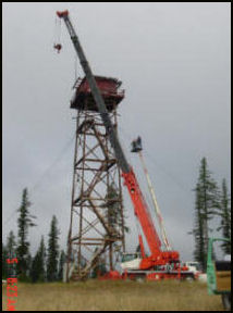 Restored cab remounted by crane