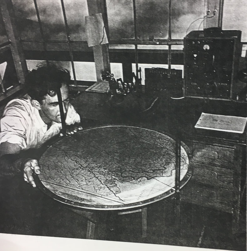 Lookout Gerald Fawley using an Osborne Fire Finder at High Knob