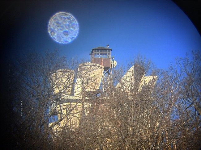 View of tower through binoculars