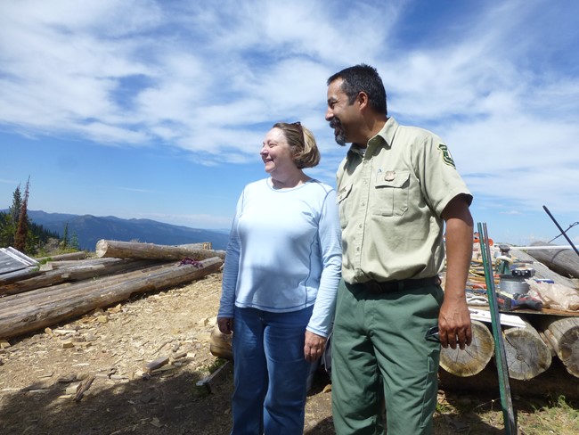 1972 lookout Molly Morrison with Forest Supervisor Tim Garcia in 2015